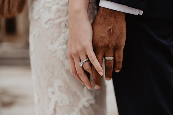 50-two-persons-wearing-silver-colored-rings-3585798-1