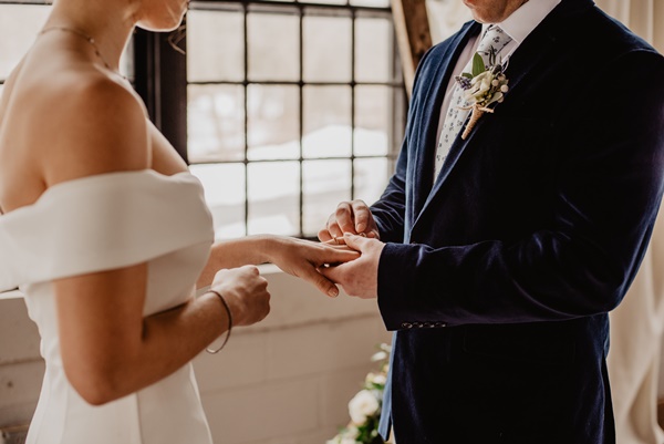 50-woman-and-man-holding-each-others-hands