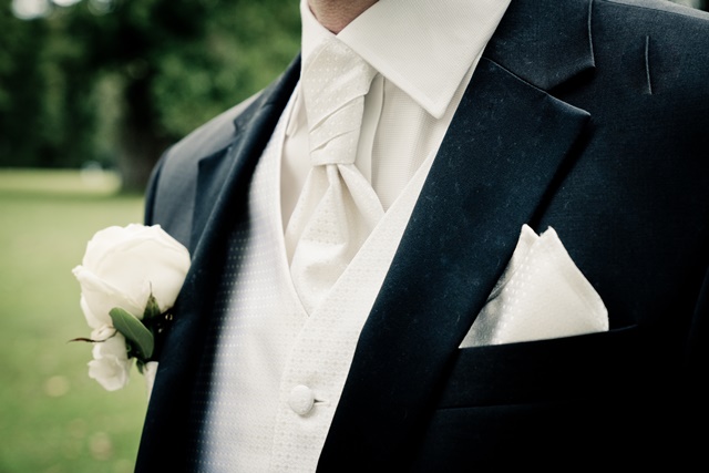man-wearing-suit-in-close-up-photography-1545348