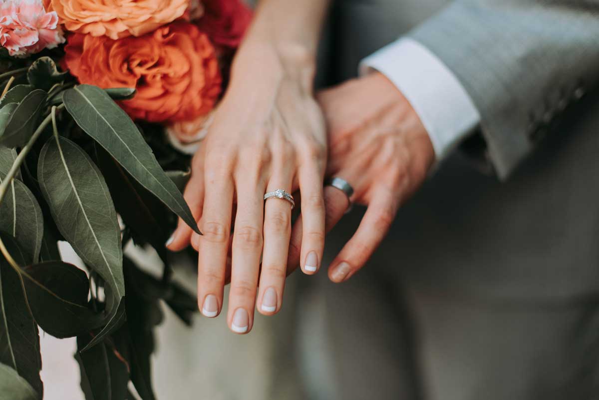 couple hand wedding