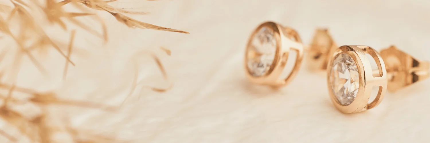 solitaire diamond stud earrings rose gold