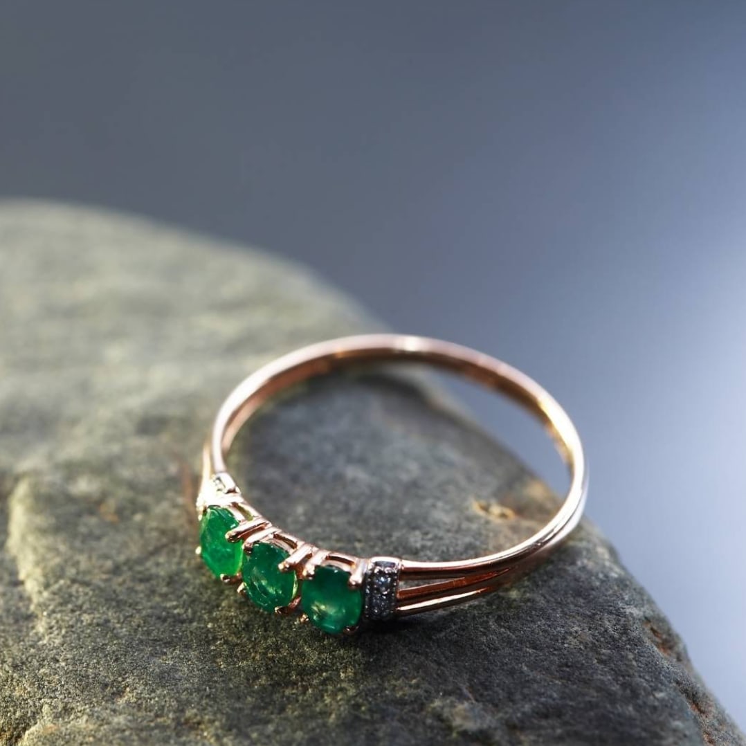 three stone emerald ring